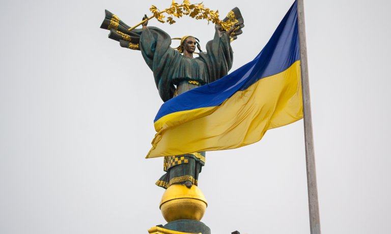 Ukraine’s Independence Monument with the blue and yellow national flag